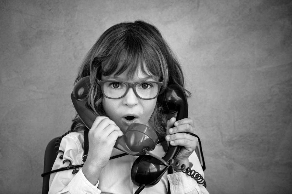 blog cover image. Child on the phone